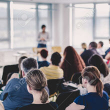 164571225-business-and-entrepreneurship-symposium-speaker-giving-a-talk-at-business-meeting-audience-in