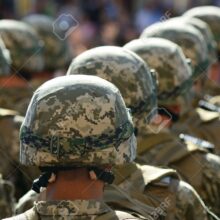 44372325-rows-of-soldiers-in-helmets